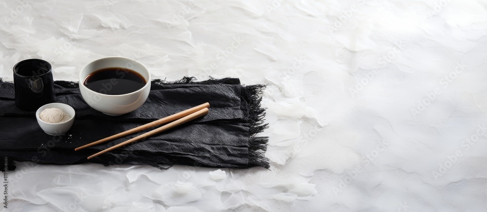 Dry nori sheets rice soy sauce and chopsticks on light grey marble table flat lay Space for text. copy space available Dry nori sheets rice soy sauce and chopsticks on light grey marble table flat lay Space for text. copy space available