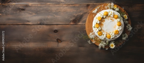 Profiterole puff dessert with yolk cream and egg white sweet filling Served on old retro vintage wooden white table Wedding cake Space for text Top view. copy space available