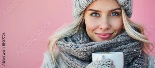 Woman in Hat and Scarf Holding Coffee Cup