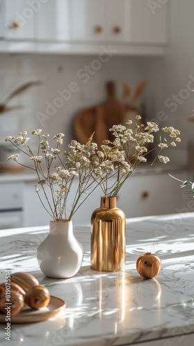 Three Gold Vases on a Table by a Window