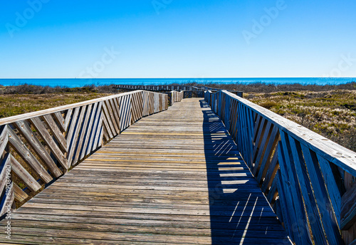 Wooden Boardwalk to Palmilla Beach on Mustang Island, Port Aransas, Texas, USA photo