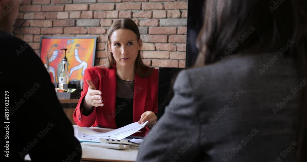 Professionals holding business meeting with clients in modern office. Discussing strategies, building relationships, consultation. Diverse group highlights collaboration, client engagement, success.