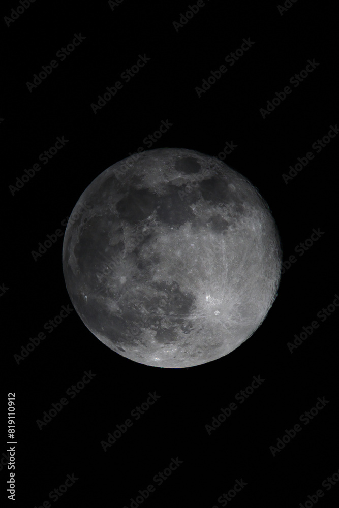 Fototapeta premium Full Moon Illuminates Dark Sky