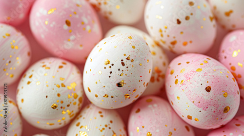 A close up of pink and white speckled Easter eggs