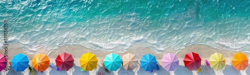 Beautiful white beach with two rows of colorful parasols.