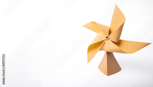 pinwheel or windmill paper origami isolated on white background simple starter craft for kids for weekend entertainment. ESG and Clean Energy Concept. Wind Turbine Paper into the Sky. Decrease Carbon