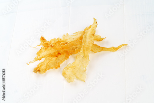 Fish maw on white background photo