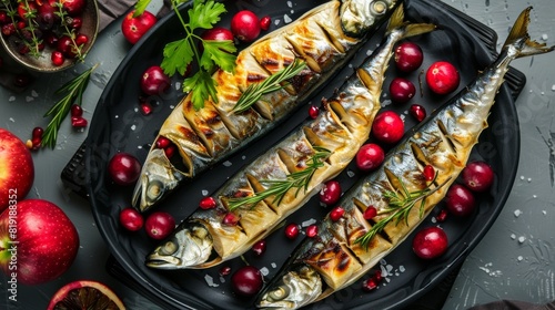 Delicious mackerel or scomber in apples and cranberry photo