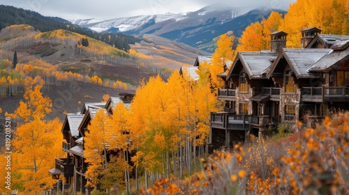 Residences on the mountain side of Bachelor Gulch with golden Fall foliage photo
