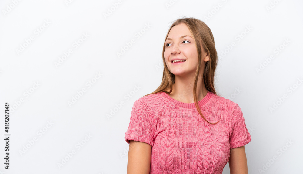 Young Russian woman isolated on white background thinking an idea while looking up Young Russian woman isolated on white background thinking an idea while looking up
