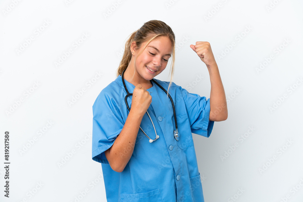 Little caucasian girl disguised as surgeon isolated on white background celebrating a victory Little caucasian girl disguised as surgeon isolated on white background celebrating a victory