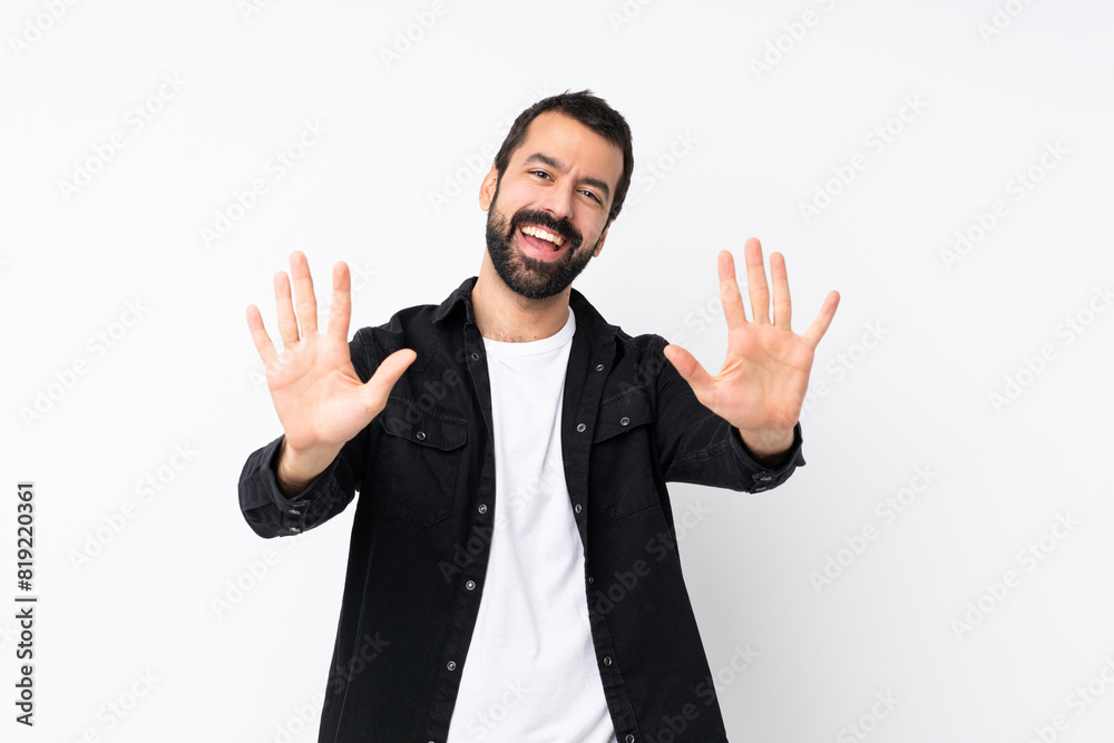 Young man with beard over isolated white background counting ten with fingers Young man with beard over isolated white background counting ten with fingers