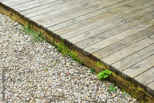 Planks terrace, gravel and garden