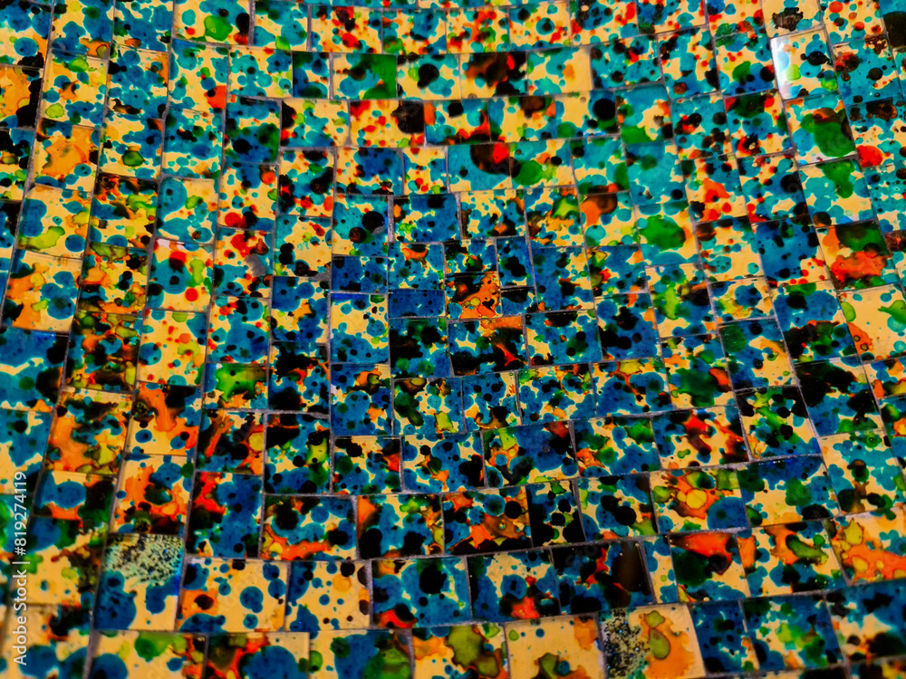 Fototapeta premium A surface of colorful mosaic tiles in close-up with many different colors.