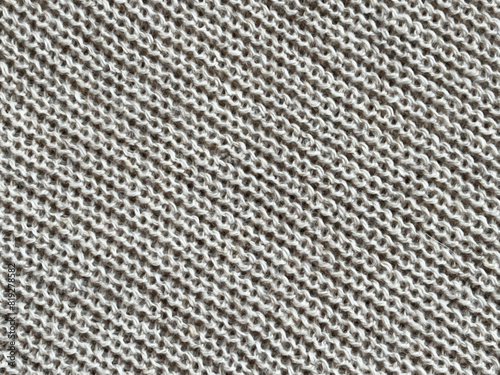 Texture of knitted woolen fabric close up