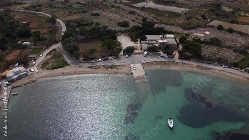 Boat slip way and beach, Mistra bay malta, May 2024 - Aerial view. High quality FullHD footage photo