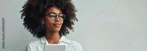 Young Woman Using Tablet Computer