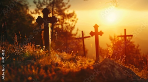 Silhouettes of old wooden crosses in contrasting sunlight. A pilgrimage site on a mountain in the photo