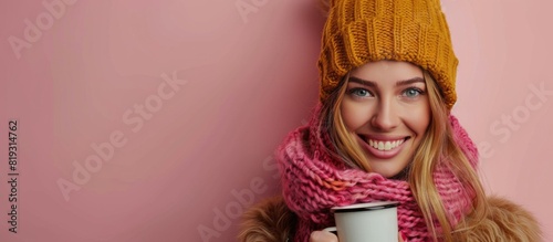 Woman Wearing Hat and Scarf Holding Cup of Coffee