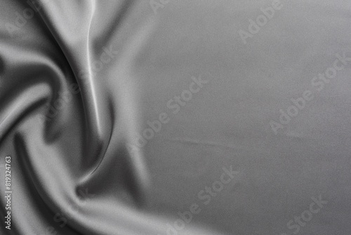 Texture of beautiful light grey silk fabric as background, closeup