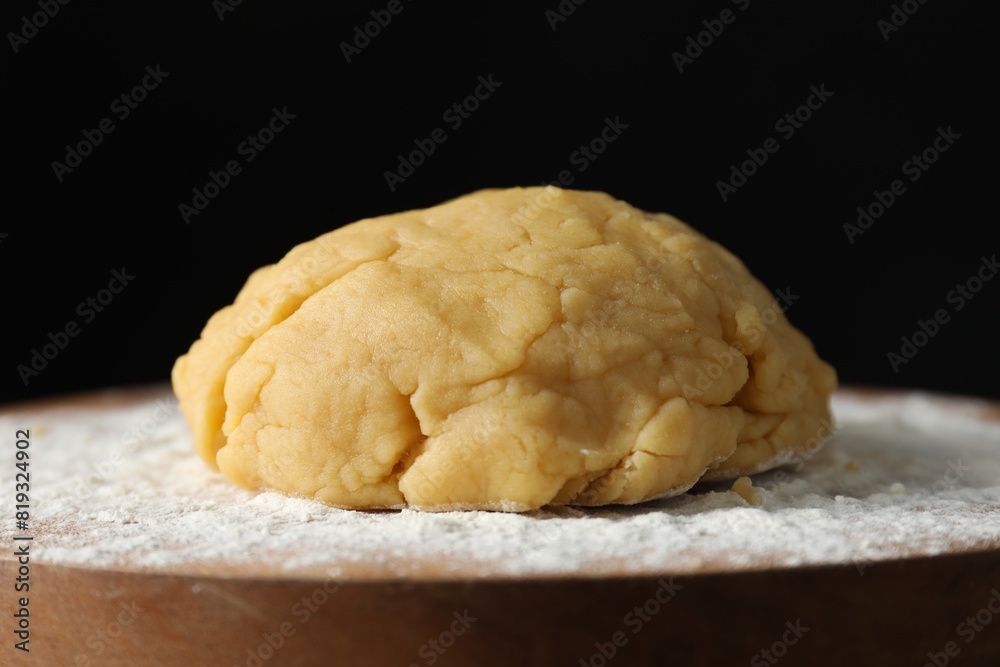 Making shortcrust pastry. Raw dough and flour on board, closeup Making shortcrust pastry. Raw dough and flour on board, closeup