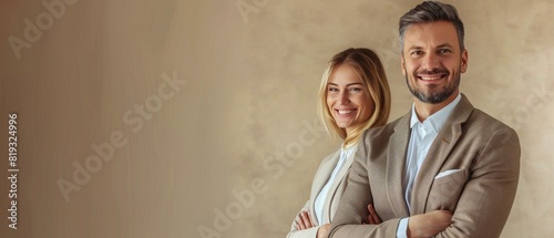 Businessman and Woman Posing Together