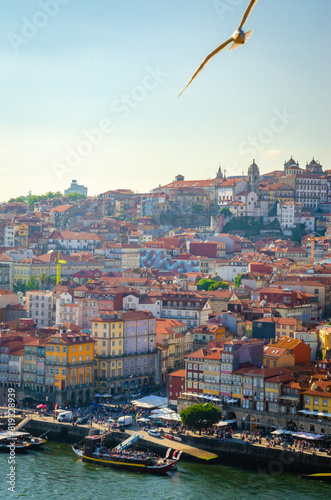 Panoramic view of Douro River and old town Porto, Portugal at sunset