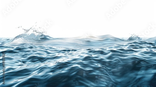 Blue ocean waves with splashes under bright sunlight