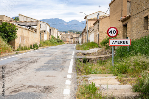 a paved road entering Ayerbe, comarca of Hoya de Huesca, province of Huesca, Aragon, Spain photo