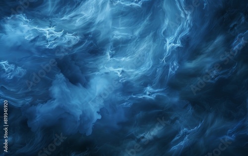 Dramatic dark blue storm clouds swirling in a moody sky.