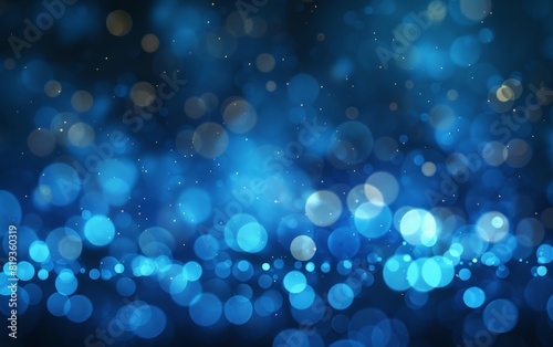 Soft blue bokeh lights gently diffusing in a dark background. photo
