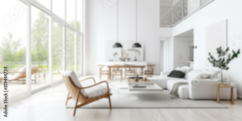 Defocused shot of a bright  airy Scandinavian-style living space with minimalist design. Resplendent.