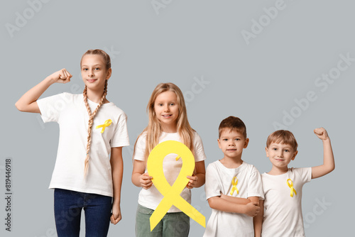 Group of kids with yellow r...