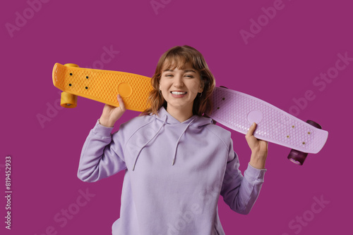 Young happy woman with skat...