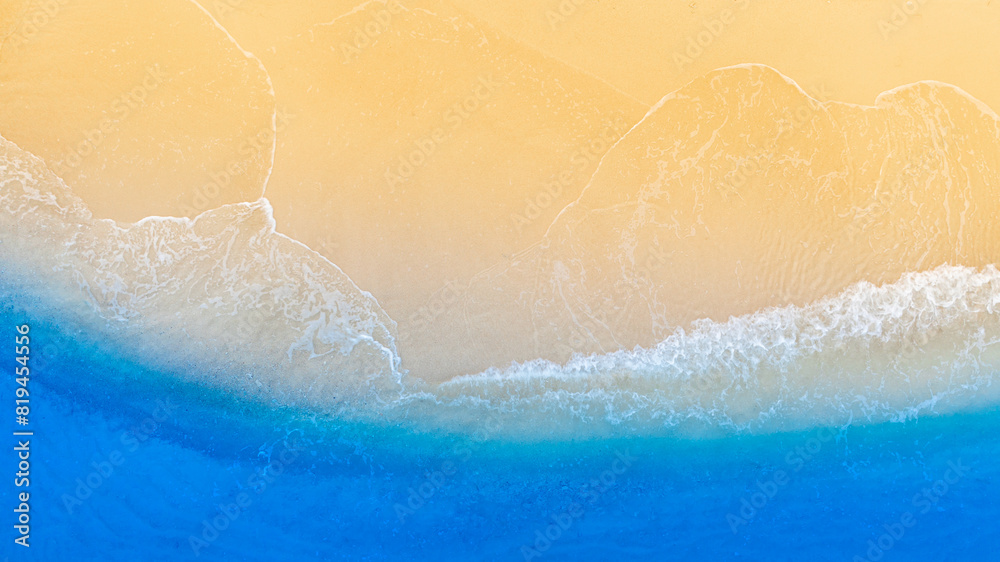 Fototapeta premium Top view nature of the beach and sea Summer with sunshine, sandy beaches, clear blue waters sparkling against the blue sky. on island with good ecology and environment Background for summer vacation