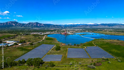 Fotografi Solar Farm and Power Plant with Flatirons in Boulder Colorado
