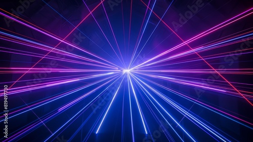 Against a deep black background, beams of bright blue and violet laser light shine, creating a vibrant and energetic display. The interplay of the two colors against the darkness enhances 