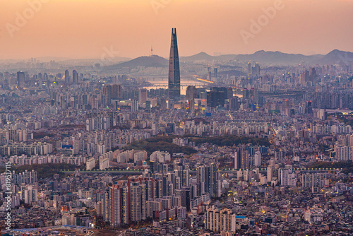 High angle view of Lotte tower surrounded by cityscape of Seoul, South Korea.
