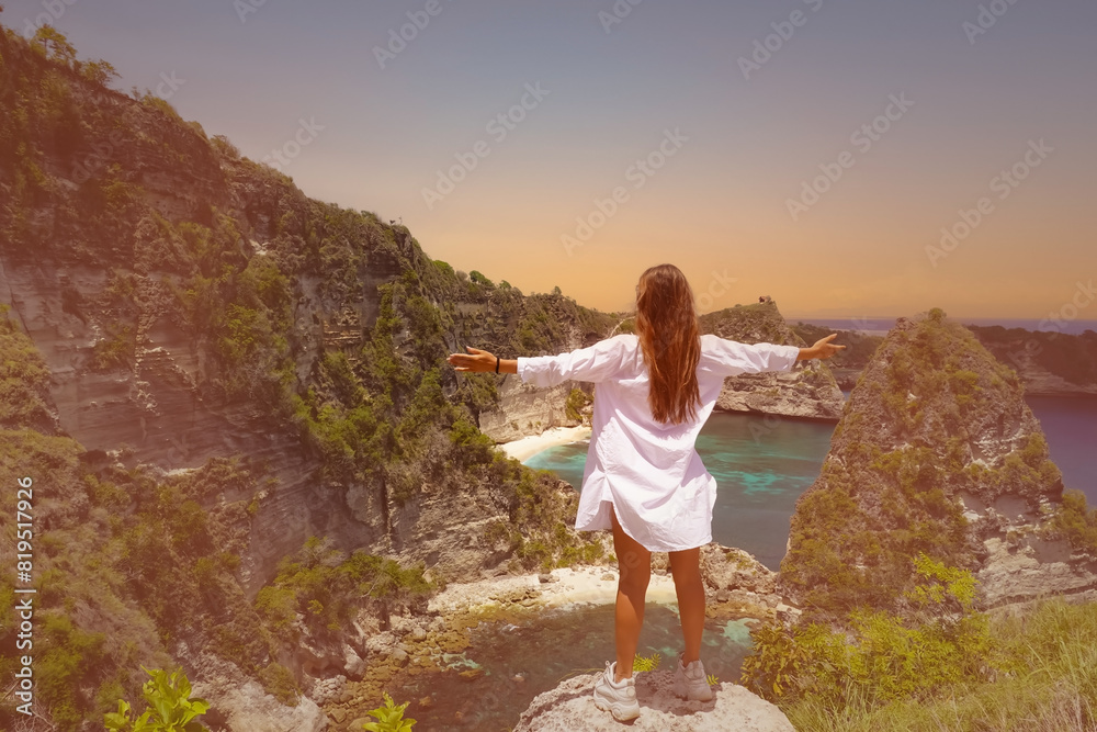 Naklejka premium Happy young woman lifestle as freedom mood at summer tropical beach concept