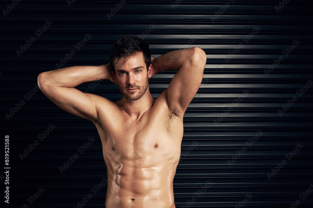 Fototapeta premium Muscle, fitness and portrait of man on wall background for training, exercise and bodybuilder workout. Sports, athlete and person with strong, muscular body for wellness, health and performance