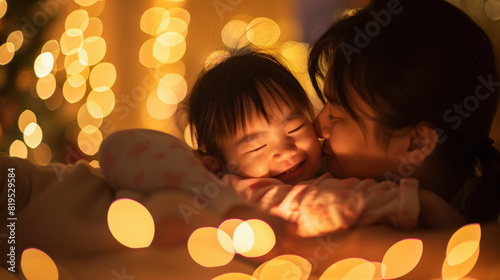 A tender moment between a parent and child, smiling together amidst a warm, blurred backdrop of festive lights that suggest a cozy holiday atmosphere. photo