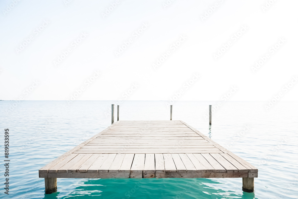 Fototapeta premium Wooden Dock Extending Over Calm Water