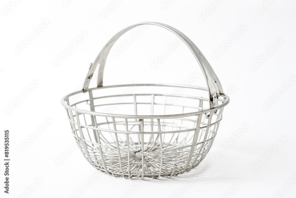 Obraz premium Silver metal basket with handle on white background