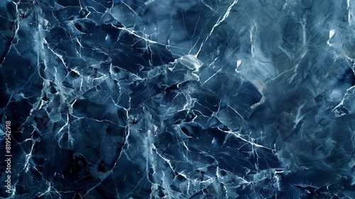 A minimalist and modern shot of a deep blue marble pattern, with elegant and understated textures and forms. photo