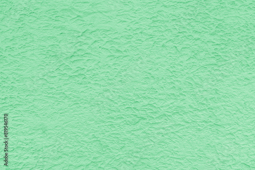 Texture of green rough plaster. Abstract design background.