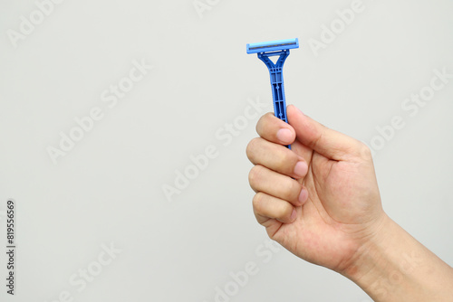 Razor for shaving men's pubic hair
