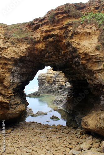 Natural rock formation forming an archway at The Grotto on the Great Ocean Road in Victoria, Australia