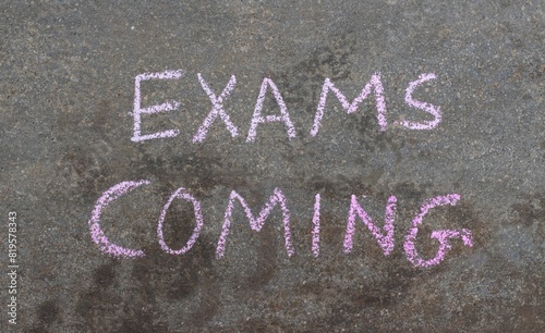 Exams Coming Phrase Written Blackboard with Chalk, Study or Education Concepts