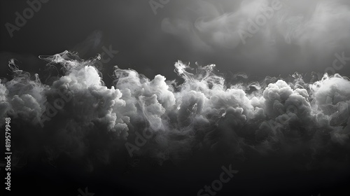 Gray Smoke Cloud Engulfs Dark Background in a Monochromatic Haze photo