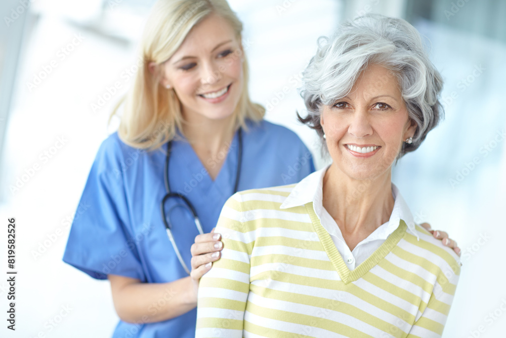 Nurse, woman and mature portrait for trust, healthcare and hand on shoulder with medical worker in hospital. Appointment, checkup and caregiver for support with professional, patient and happy Nurse, woman and mature portrait for trust, healthcare and hand on shoulder with medical worker in hospital. Appointment, checkup and caregiver for support with professional, patient and happy